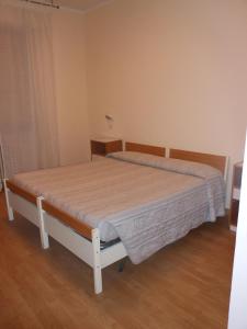 Postel nebo postele na pokoji v ubytování Hotel Cecco