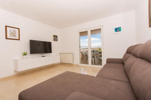 TV/Unterhaltungsangebot in der Unterkunft Apartments Vukman