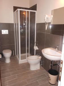 Koupelna v ubytování Hotel Cecco