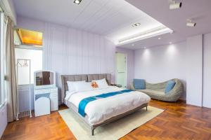 Postel nebo postele na pokoji v ubytování WMS Villa