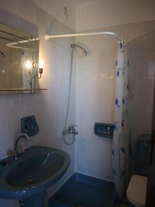 Kúpeľňa v ubytovaní Oliaria Apartments