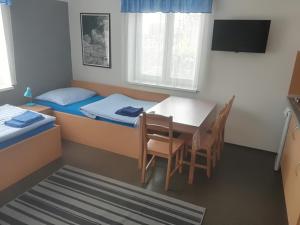 Posteľ alebo postele v izbe v ubytovaní Penzion 411