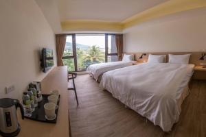 Postel nebo postele na pokoji v ubytování KET Hotel + 22 fotografií