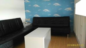A seating area at SKY square Homestay