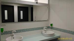 A bathroom at SKY square Homestay
