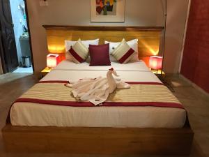 Postelja oz. postelje v sobi nastanitve Hotel Heladiv