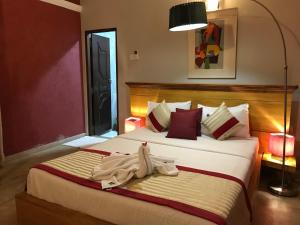 Postelja oz. postelje v sobi nastanitve Hotel Heladiv
