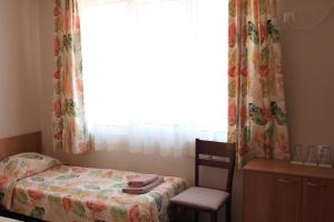 Postel nebo postele na pokoji v ubytování Hotel Radik