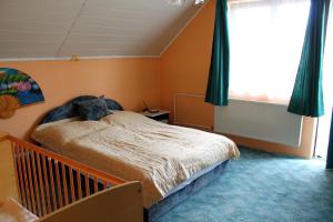 Postel nebo postele na pokoji v ubytování Ibolya Apartmanok + 34 fotografií