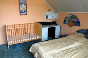 Postel nebo postele na pokoji v ubytování Ibolya Apartmanok