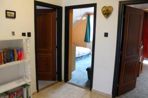 Postel nebo postele na pokoji v ubytování Ibolya Apartmanok