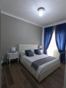 A bed or beds in a room at Casa Carraturo