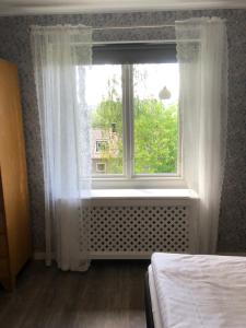 Katil atau katil-katil dalam bilik di Helsingegården