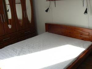 Ліжко або ліжка в номері Hullám Apartman
