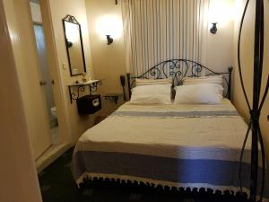 Postel nebo postele na pokoji v ubytování A&B Home Hotel