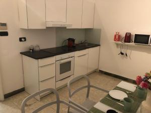 Kuchyňa alebo kuchynka v ubytovaní Nunziata Apartment