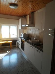 Η κουζίνα ή μικρή κουζίνα στο Appartamento Magnolia