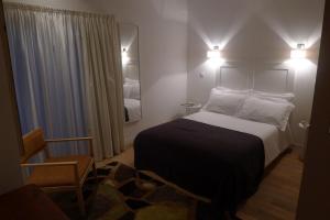 Letto o letti in una camera di Quinta das Lavandas