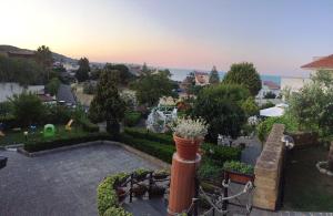 a view of a garden with plants and flowers at B&B Magna Grecia in Crotone