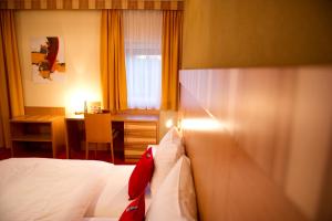 Postel nebo postele na pokoji v ubytování Pension Appartement Lanzer