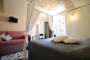 A bed or beds in a room at U Campanin