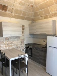 Kuchyň nebo kuchyňský kout v ubytování Casa Profumi di Puglia