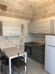 Virtuve vai virtuves zona naktsmītnē Casa Profumi di Puglia