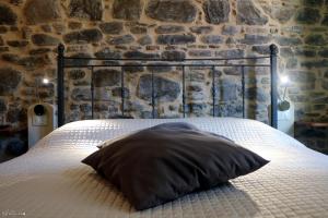 A bed or beds in a room at U Campanin