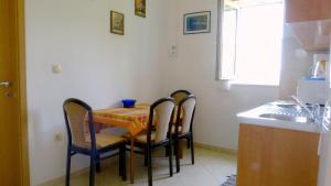 Kuchyň nebo kuchyňský kout v ubytování Beach front apartments Balica Rat