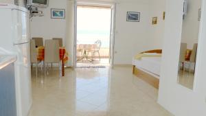 Postel nebo postele na pokoji v ubytování Beach front apartments Balica Rat