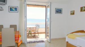 Postel nebo postele na pokoji v ubytování Beach front apartments Balica Rat