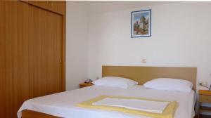 Postel nebo postele na pokoji v ubytování Beach front apartments Balica Rat
