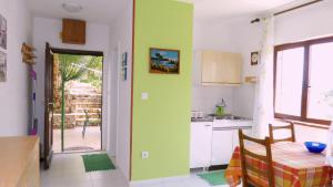 Kuchyň nebo kuchyňský kout v ubytování Beach front apartments Balica Rat + 26 fotografií