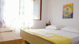 Postel nebo postele na pokoji v ubytování Beach front apartments Balica Rat