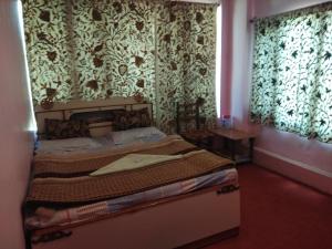 Letto o letti in una camera di Hotel Jannat