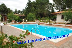 a swimming pool in a villa sea and archaeology at VILLASEASICILY or VILLA Sea And Archaeology in Balestrate
