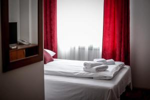 Ένα ή περισσότερα κρεβάτια σε δωμάτιο στο Hotel BOB