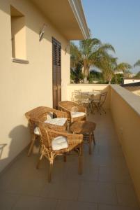 A balcony or terrace at Oasi Tortuga Residence Piscina e barbecue h24
