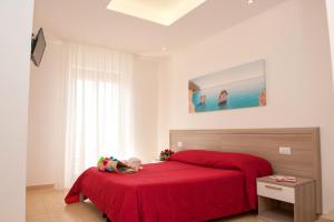 Rúm í herbergi á Albergo San Giorgio