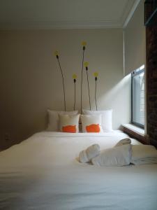 Cama o camas de una habitación en East Village Hotel