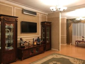 
Телевизор и/или развлекательный центр в Tverskaya Apartment near Red square
