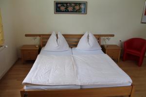 Voodi või voodid majutusasutuse Gasthof Eschau toas