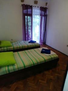 Postel nebo postele na pokoji v ubytování Guesthouse Nikoleta