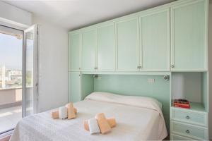 Postel nebo postele na pokoji v ubytování Hotel Pacific