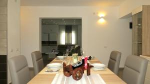 Posedenie v ubytovaní Ane Apartment