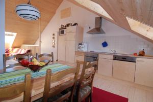 Kuchyň nebo kuchyňský kout v ubytování Ferienwohnung Sonnenhof + 9 fotografií