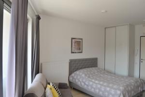 Posteľ alebo postele v izbe v ubytovaní Apartament Horyzont 405 Międzyzdroje