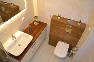 Kúpeľňa v ubytovaní Apartament Horyzont 405 Międzyzdroje + 16 fotografií
