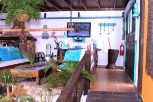 A television and/or entertainment centre at Villa Spa Las Tinajas