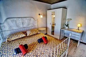 Кровать или кровати в номере Amazing sea views Veglia house